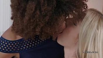 Interracial lesbian oral sex in bedroom