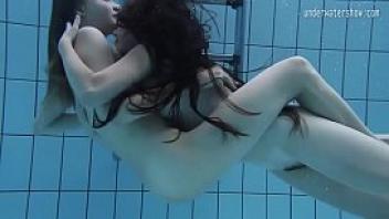 Two hot lesbians in the pool loving eachother