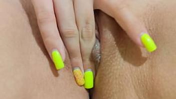 Young girl with yellow manicure sexily masturbates her wet pussy luxuryorgasm