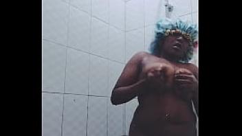 Solo ebony becky taking a hot shower in a bathroom