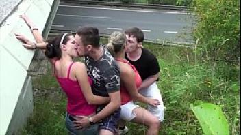 Cum on a chubby girl with big tits in extreme public foursome sex by a highway