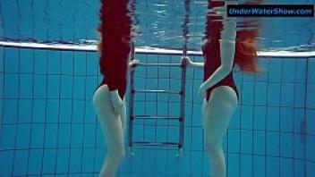 Two hot teens underwater