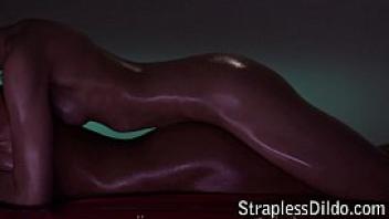 Oiled strapon play