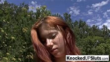 Pregnant redhead takes a facial outdoors