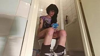 Teen girl pissing amp while playing on her telephone pt1 hd