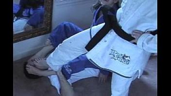 Mixed judo grappling in uniform