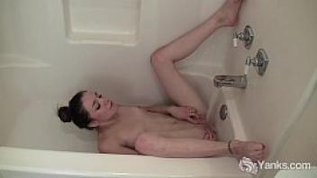 Wet indian girl in the bath tub