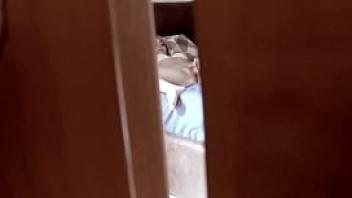 Spying behind a door a teen stepdaughter masturbating in bedroom and coming very intense