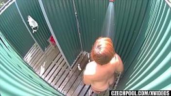 Busty milf spied in public shower