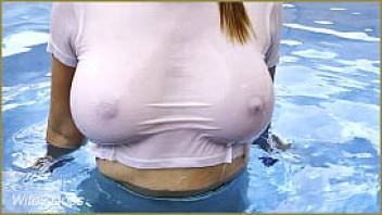 Amazing hot wife in wet t shirt in the hotel pool risky public exhibitionist