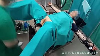 Gynecologist having fun with the patient