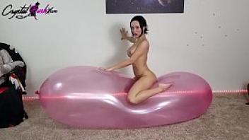 Perfect boobs babe masturbate on an inflated condom solo