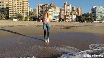 Wet shoot on a public beach with crazy model risky outdoor masturbation foot fetish pee in jeans