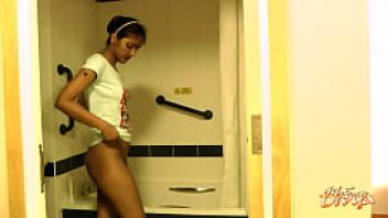Seductive dark skin college girl striptease in shower