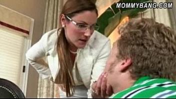 Sexy stepmom in glasses caught teen couple fucking on the couch