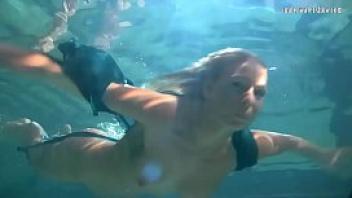 Blonde feher with big firm tits underwater