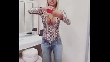 Blonde with big tits doing magic trick who is she