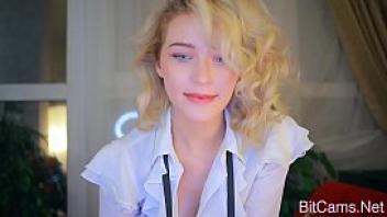 Pretty blonde camgirl shows tits