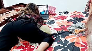Indian girl has an orgasm while watching desi porn on laptop