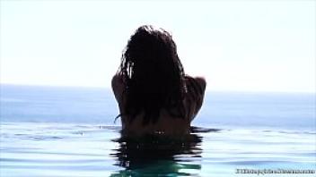 Little caprice playing with her pussy in malibu infinity pool