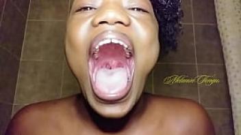 Yietonguefetishvidss tonguefetish model melanintongue showing how wide her mouth stretches open
