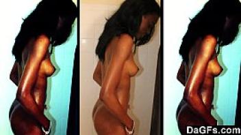 Dagfs skinny ebony caught while she takes a shower and masturbates for the camera