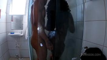 Black brazilian crouched down to suck the dick and it was nice under the shower