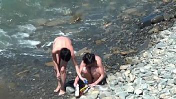 Spy naked girls at the beach shore