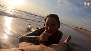 Real couple having fun on a nudist beach sexy wet blowjob