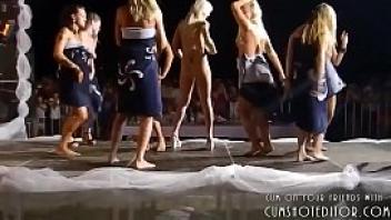 Women partying naked on stage