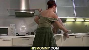 His mom and gf fool around in the kitchen