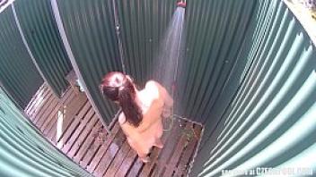 Brunette milf showering in public pool hiddencam reality