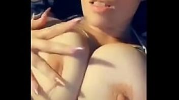 Rubbing her big soft titties