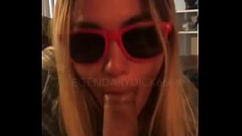 Babe with sunglasses sucks huge uncut cock
