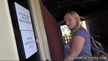 Melissa may works on two black cocks at a glory hole public restroom and dogfartnetwork
