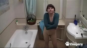 Chunky milf spyed on by a peeping tom while she takes a bath hidden camera masturbating