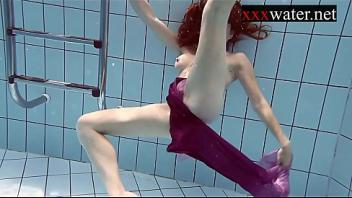 Smoking hot russian redhead in the pool