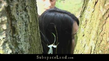 Hot brunette restrained in the woods and fucked